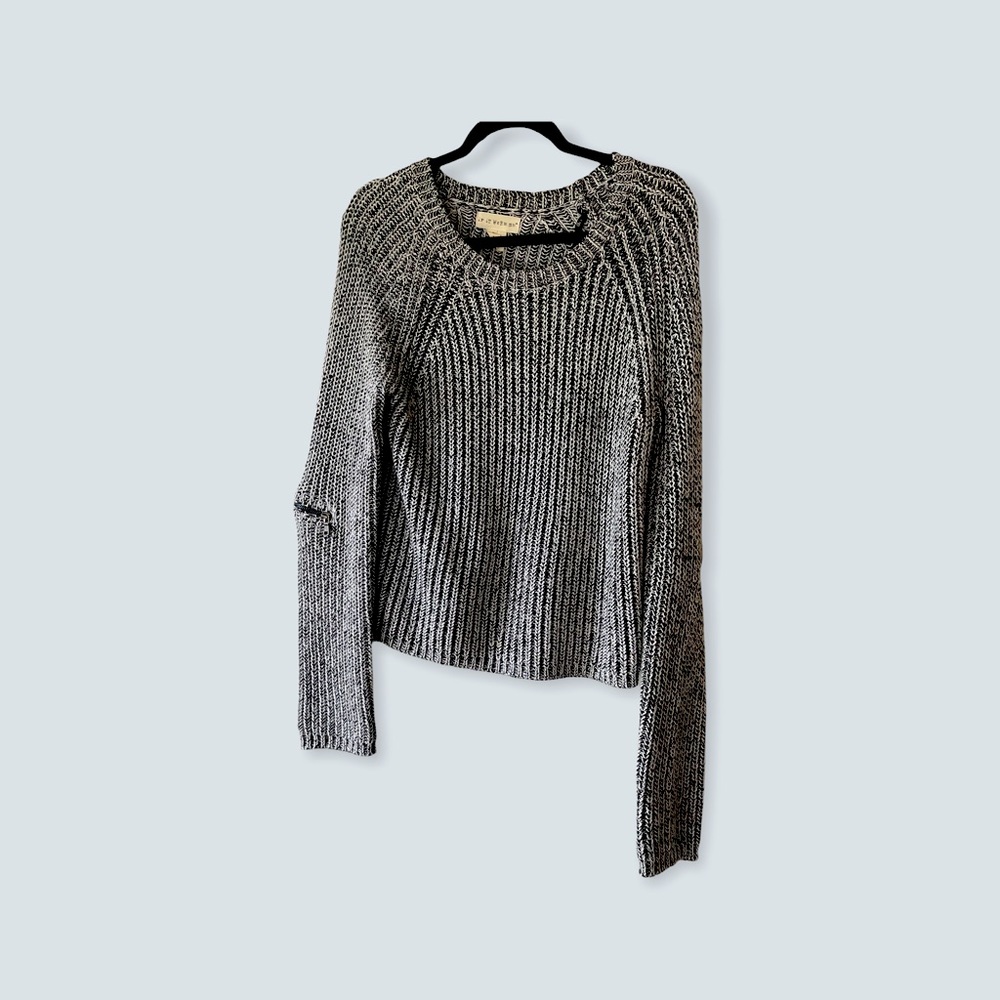 L zippered cableknit sweater